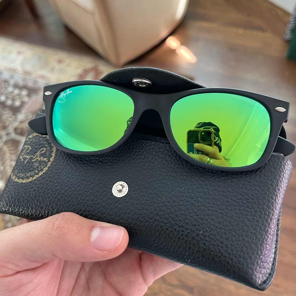 Ray Ban, black sunglasses with green reflective lens